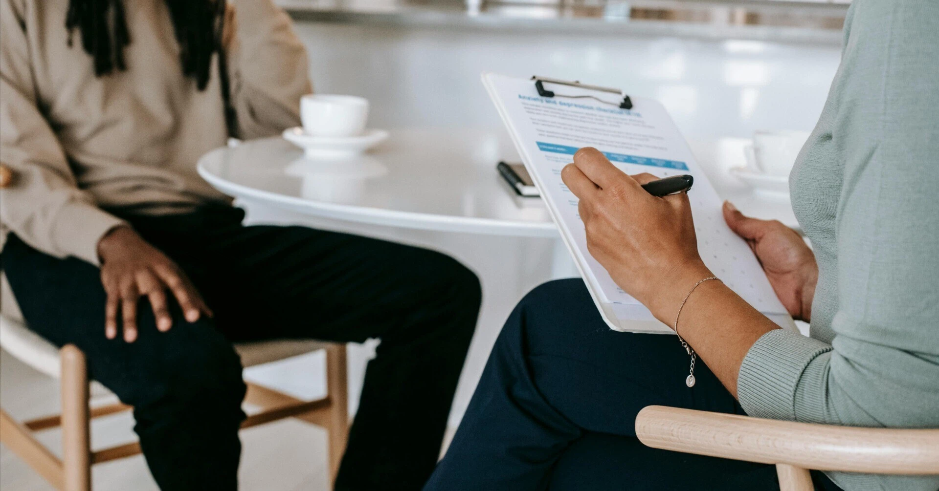 A marketer listening to customer feedback, gathering insights through surveys and interviews