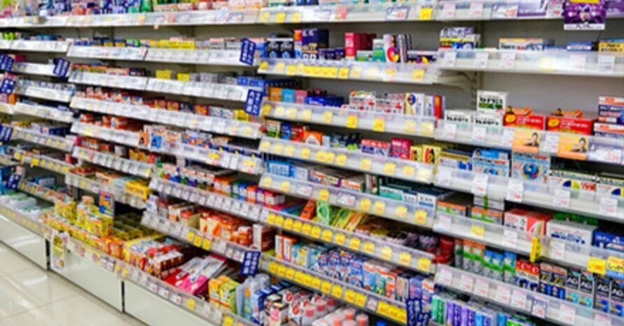 A shelve filled with drugs at a drugstore