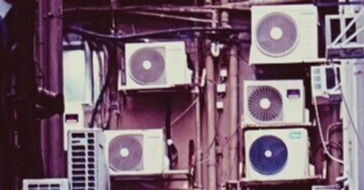 Outdoor units of air-conditioners on a wall