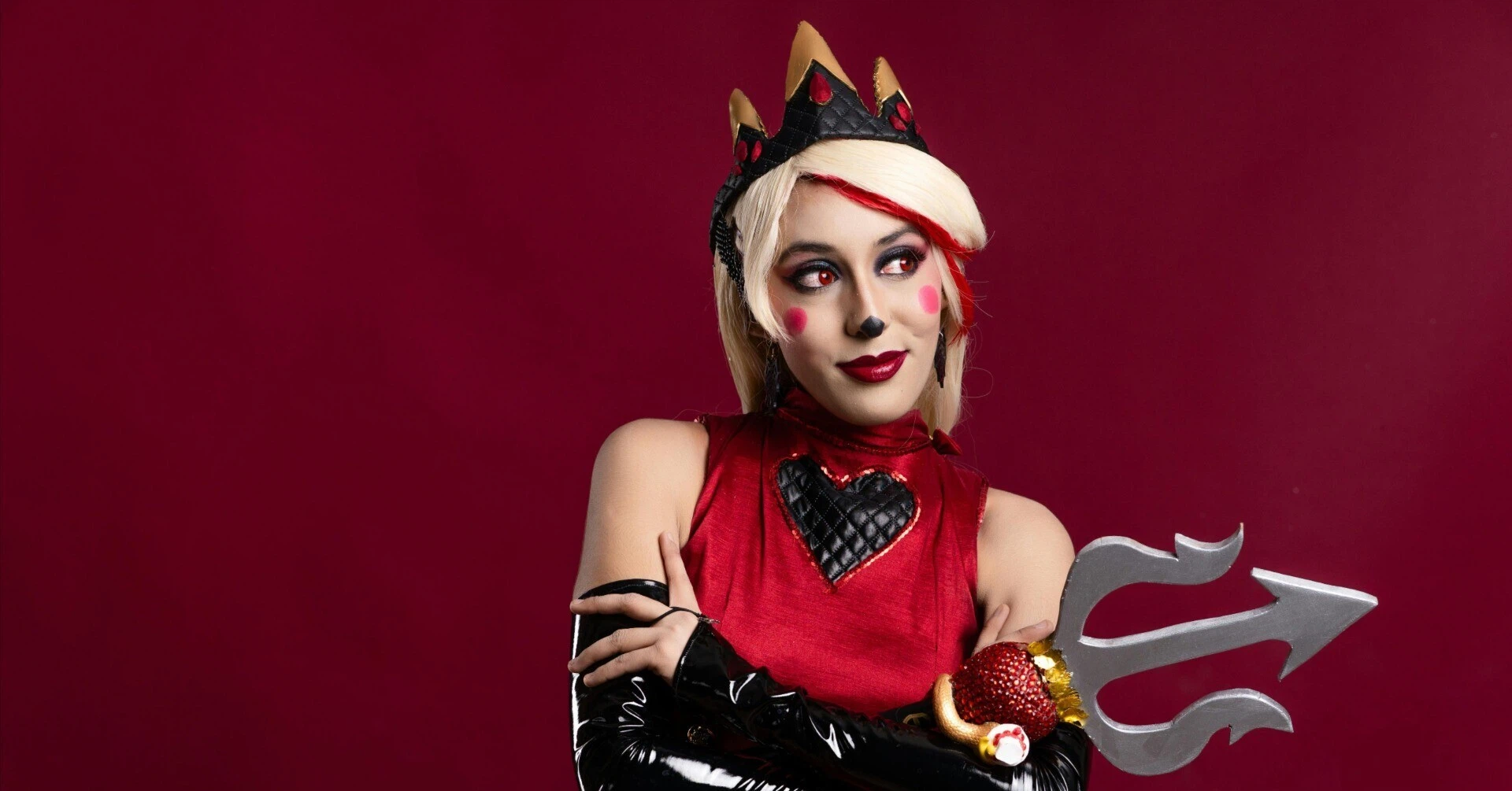 A woman in Queen of Hearts cosplay, challenging concepts of TPO and marketing. Her self-expression based on personal "likes" shows a key to new marketing strategies.