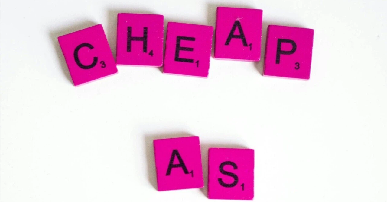 Pink letter tiles spelling "CHEAP AS" on a white background